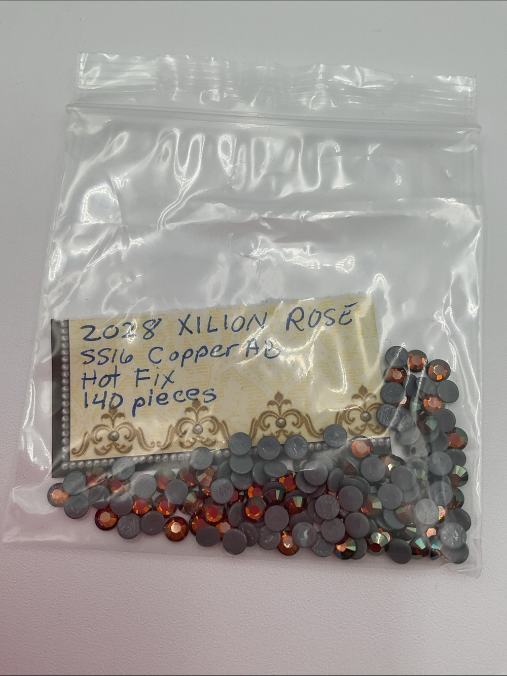 Swarovski • Color: Copper Aurora Borealis, 2028 XILION Rose Hotfix Rhinestones